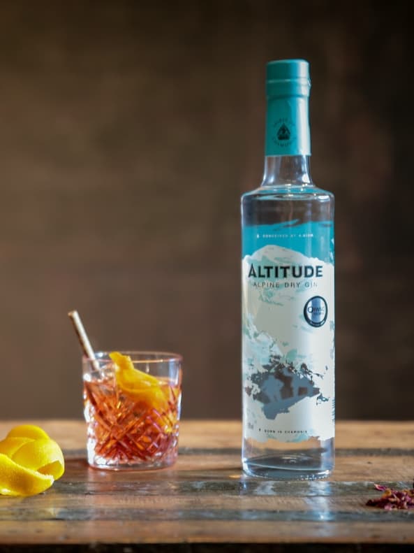 Altitude Dry Gin Glass bottle made by Verallia, including a printed design of a snowy mountain.