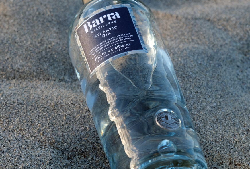 Isle of Barra Gin sustainable glass bottle made by Verallia, featuring mould shaped like waves