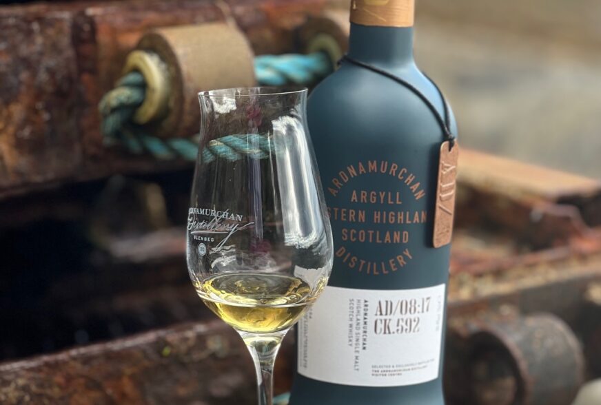 Ardnamurchan whisky glass bottle made by Verallia, featuring blue printed design