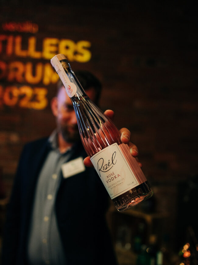 Close up shot of someone holding Rozel Rose Vodka at Verallia Distillers Forum 2023